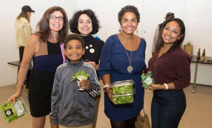 Manuela Zamora, Executive Director of NY Sun Works, poses with participants at a launch party for NY Sun Works' online Learning Center on Friday, October 13 at Project Farm House in New York City.