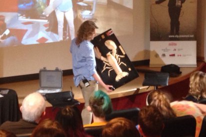 Biologist Victoria Howse from the Department of Fisheries and Oceans Canada shows students an 8.5 lb lobster while discussing the Eastport Marine Protected Area.